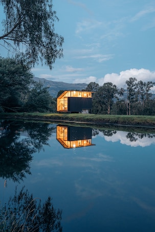 Exterior. Welcoming 1-bedroom cabin in Cayambe with pond
