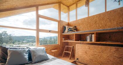 Welcoming 1-bedroom cabin in Cayambe with pond