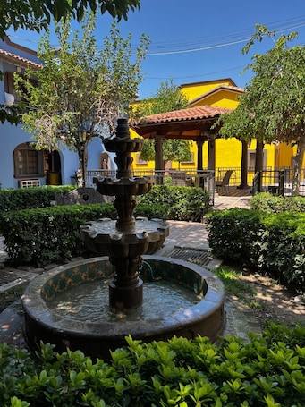 Outdoor spa tub. Hotel Suites EL Paseo