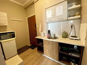 Kondominium Comfort, balkon, pemandangan kota | Dapur pribadi