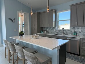 Fridge, microwave, oven, stovetop - Across from the beach, Brand New Ocean View Home | Walk to Beach & Downtown FMB (Fort Meyers Beach)
