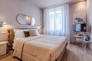 Ferros/tábuas de passar roupa, acesso à internet, roupa de cama