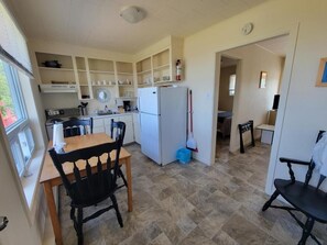 Apartment, 1 Bedroom, Kitchen, Sea View | Private kitchen | Mini-fridge, microwave, stovetop, cookware/dishes/utensils - Motel Appartements le Saint-Patrick (Sainte-Flavie)