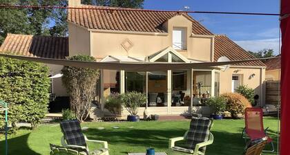 Guest Room “Chez Anne-Marie et Constant” with Shared Terrace, Garden, and Wi-Fi