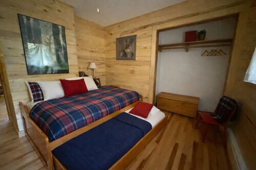 Waterfront Burt Lake Cottage | Sleeps 6