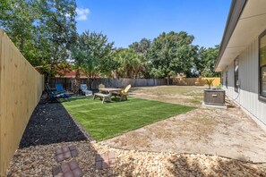 Outdoor dining - 2BR King, Yard Access + Private Patio, Desk, Sleeps 6, Near Beaches, Dogs OK (Gulf Breeze)