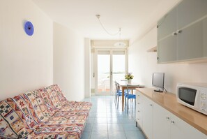 Apartment, 1 Bedroom, Balcony, City View | Living room - Bright Top-floor Apartment With sea View (Lignano Sabbiadoro)