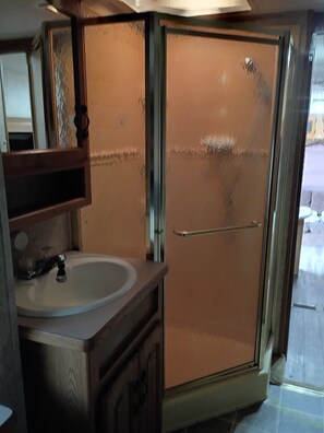 Shower, towels, soap, toilet paper - 1-bedroom recreational vehicle in tranquil Guy, Texas on a beautiful horse farm. (Guy)