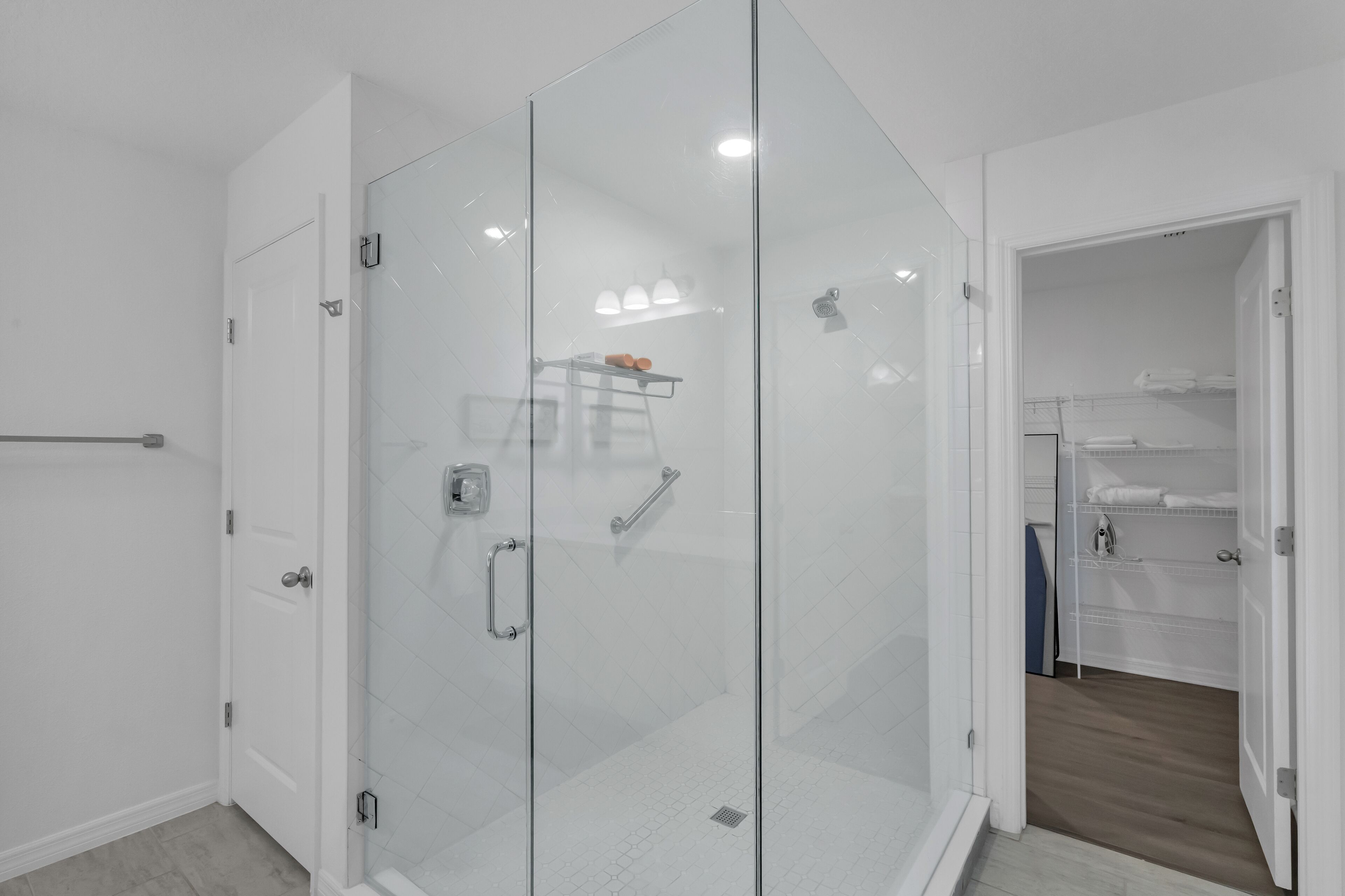 Shower, hair dryer, towels, shampoo
