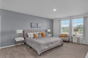 3 bedrooms, desk, iron/ironing board, free WiFi - Your Perfect Disney Getaway - Stylish Home for 12 w/ Pool & Free Resort Access (CHAMPIONS GT)