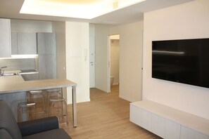 Appartement, 1 chambre, balcon, vue ville | Salle de séjour