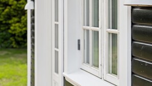 A building with white exterior walls and a window with a white frame. - "Har" - 685m from the sea by Interhome (Hornbæk)