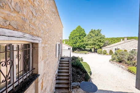 Property grounds. La Ferme d’Estafinette – Spacious Apartment with Terrace and Shared Pool