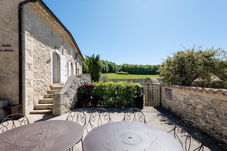 Terrace/patio. Holiday Home 'Bastide De Marius' with Shared Pool, Shared Terrace and Wi-Fi