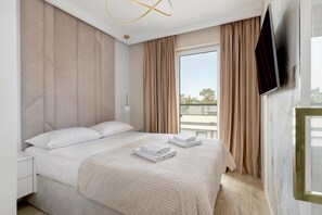 3 chambres, ameublement personnalisé, fer et planche à repasser