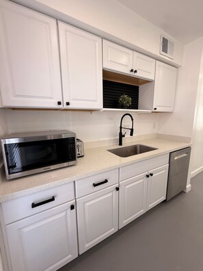 Microwave, oven, stovetop, dishwasher - Entire House 3-bedroom house in Historic Neighborhood (Phoenix)
