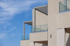 A modern building with multiple balconies and large windows. - Falasarna Bay Hotel (Kissamos)