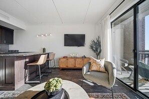 TV - Olive Tide | Riverfront Downtown | Curated Design (Wilmington)