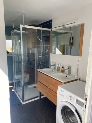 Shower, hair dryer, towels, soap