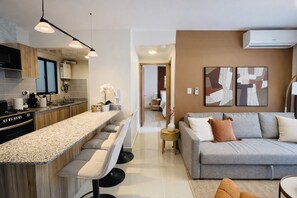 Living area - Pool Front- Clean and Modern 1-bedroom apartment in peaceful Punta Cana with AC (Punta Cana)