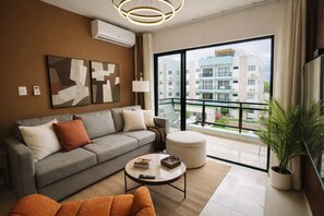 Living area - Pool Front- Clean and Modern 1-bedroom apartment in peaceful Punta Cana with AC (Punta Cana)