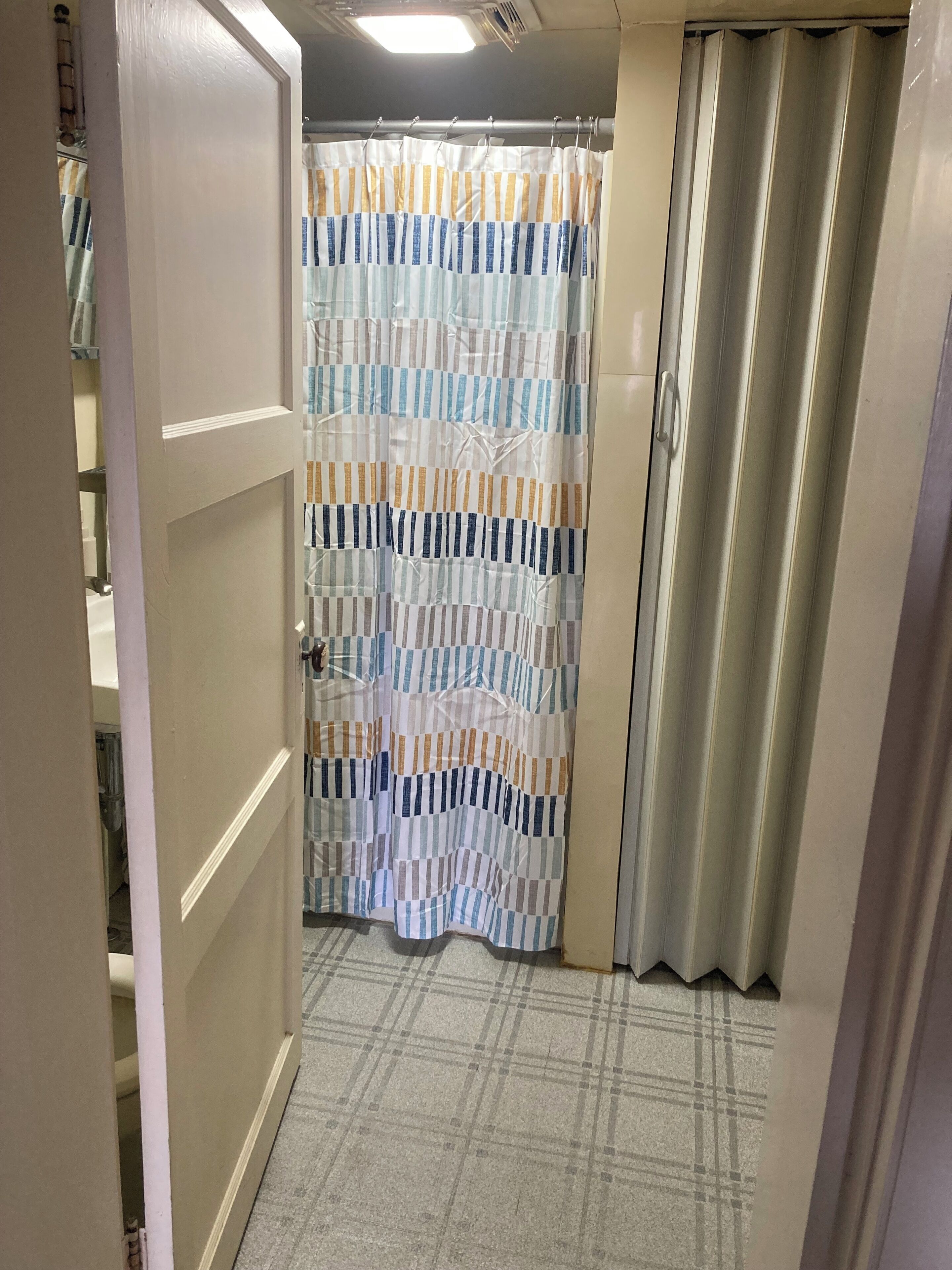 Shower, towels, soap, toilet paper
