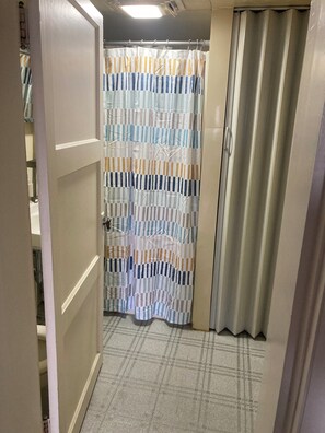 Shower, towels, soap, toilet paper