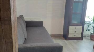 Family Quadruple Room, Kitchen | Living area