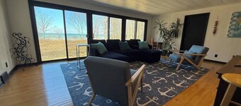 Secluded Lake Erie Escape with 550 Ft of Lake View Frontage on 7.5 Private Acres