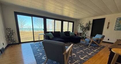 Secluded Lake Erie Escape with 550 Ft of Lake View Frontage on 7.5 Private Acres