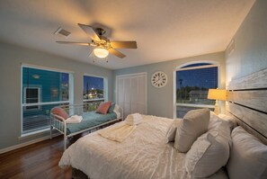 This bedroom has 1 King and 1 Single Bed - Waterfront Bay Home with Pool & Private Pier (Kemah Area)