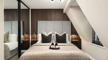 Deluxe studio suite | Donsdekens, Select Comfort-bedden, een laptopwerkplek