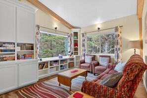 Smart TV, fireplace, DVD player, books