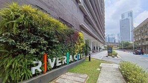 A building with a sign reading 'RIVER CITY' and a landscaped area with various plants. - KL Sentral, Kuala Lumpur, 4 pax Family Merdeka 118 Nice View, , Sky Pool MRT LRT (Kuala Lumpur)