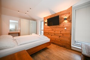 Een strijkplank/strijkijzer, gratis wifi, beddengoed