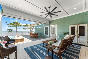 Outdoor dining - KING'S BAY - Bayfront 5-Bedroom House in N. Cape San Blas, FL with Beach Access (Port St. Joe)