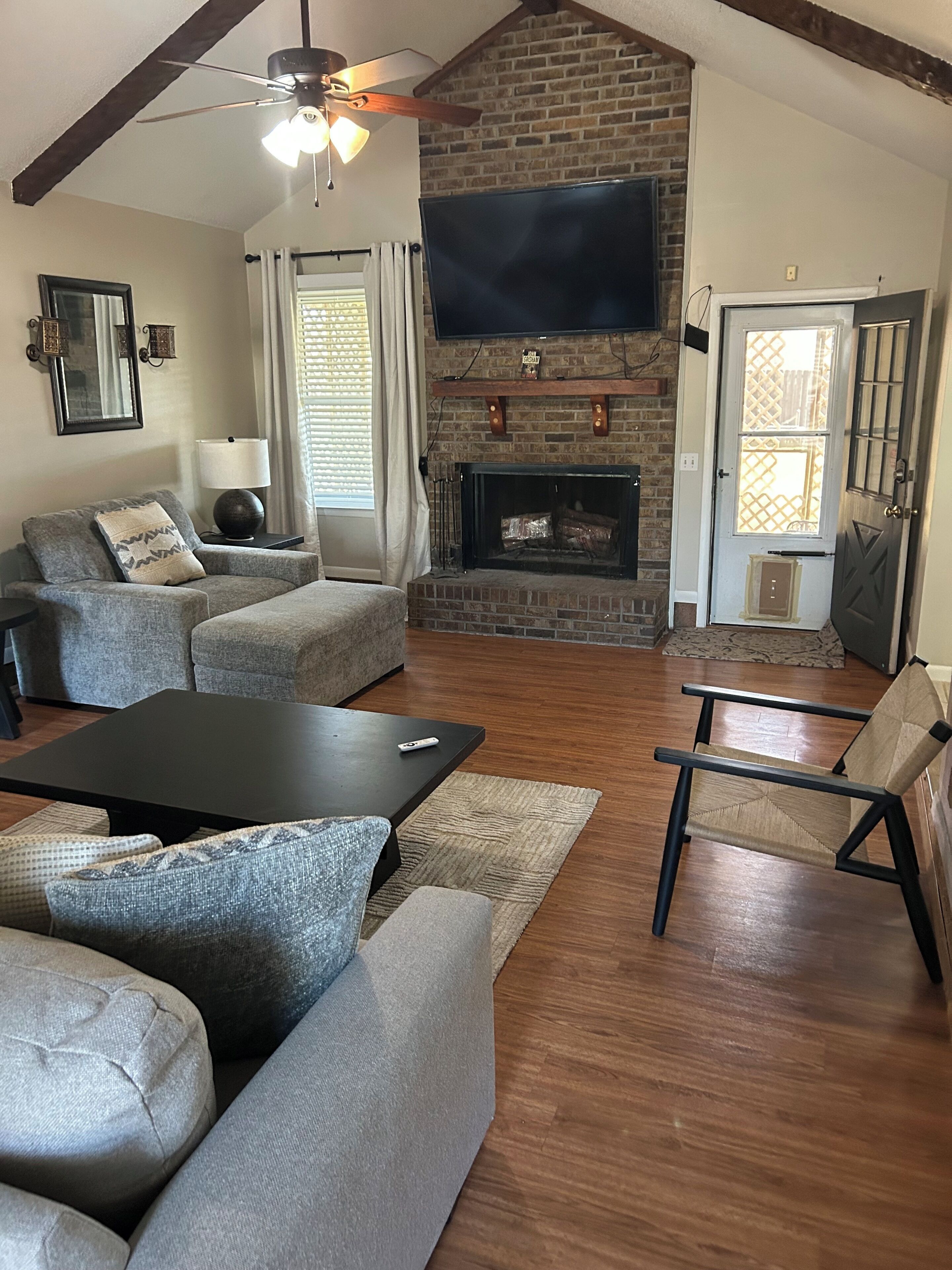 Smart TV, fireplace, books