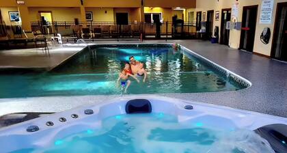 King hotel suite with living room, large fridge/freezer in Millinocket, Maine