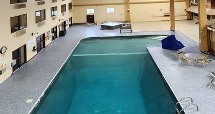 King hotel suite with living room, large fridge/freezer in Millinocket, Maine