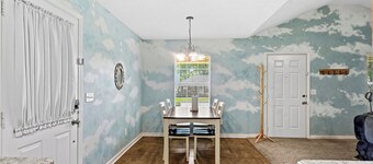 Cozy 2-bedroom family-friendly house featuring beautiful murals by local artist.