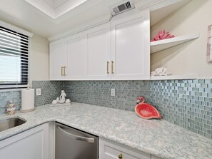 Fridge, microwave, oven, stovetop - Ocean Trillium 502 - Beachfront Condo with Oceanfront Pool (New Smyrna Beach)