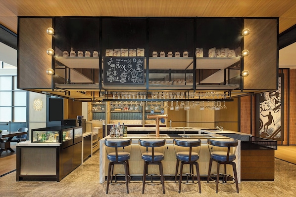 A bar area with a chalkboard menu, bar stools, and a selection of bottles. - Four Points By Sheraton Rizhao Central Activities Zone (Rizhao)