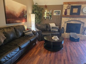 Living area - 4-bedroom house in Olathe w/ fitness equipment and finished basement. (Olathe)