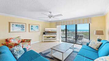 Direct Oceanfront Split-Level Condo, Unit #217 | Living area | 50-inch TV with cable channels