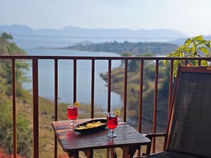 Habitació de luxe | Servei de restauració a l'aire lliure