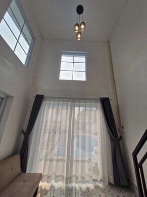 Loft, 1 King Bed with Sofa bed, Kitchenette, Pool View | Interior - River view villas (Vang Vieng)