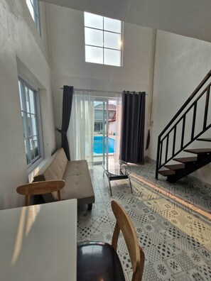 Loft, 1 King Bed with Sofa bed, Kitchenette, Pool View | Interior - River view villas (Vang Vieng)