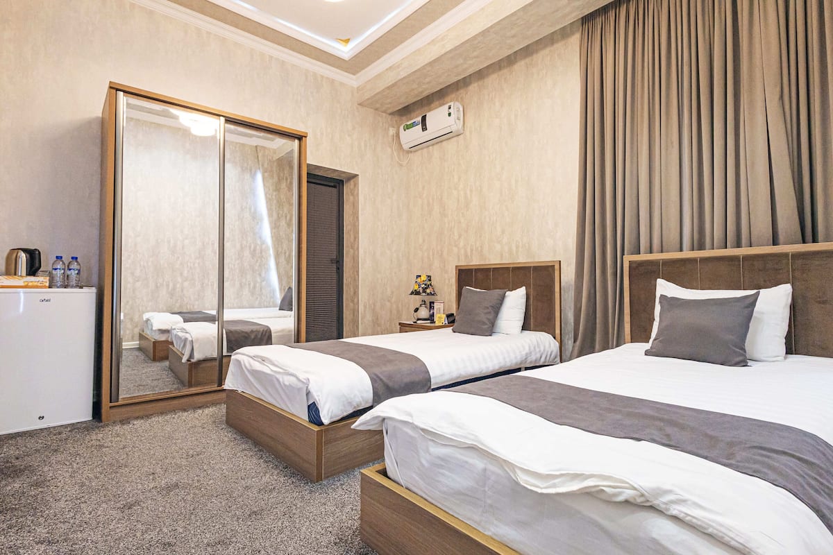 Habitación clásica con 2 camas individuales