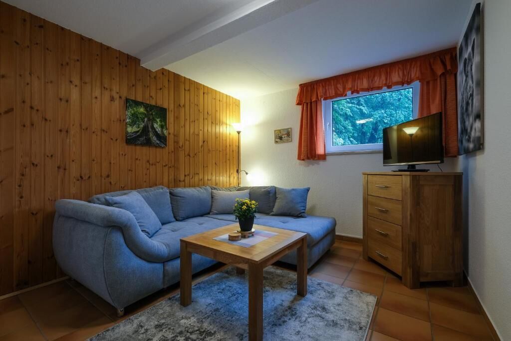 Ferienhaus, Parkblick | Wohnbereich