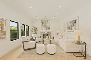 Living area - Modern 4BR Luxury Home w/ Designer Kitchen & Bright Open Living in Rancho Park (Los Angeles)